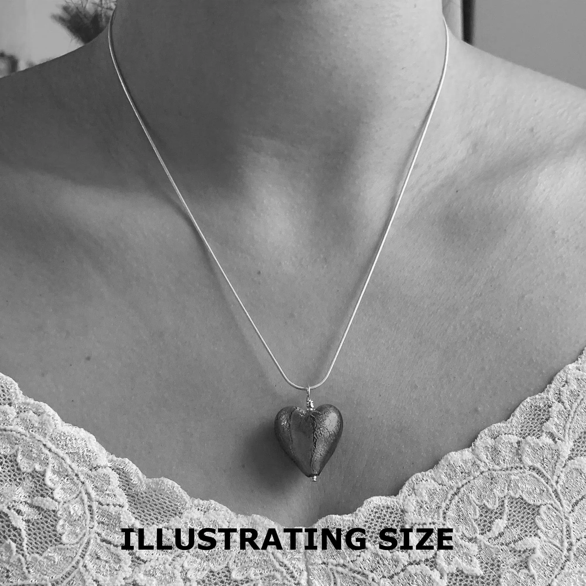 Necklace with frosted red Murano glass medium heart pendant on silver snake chain